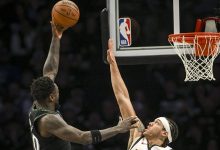 Julius Randle faz cesta sobre Aaron Gordon em MInnesota Timberwolves x Denver Nuggets